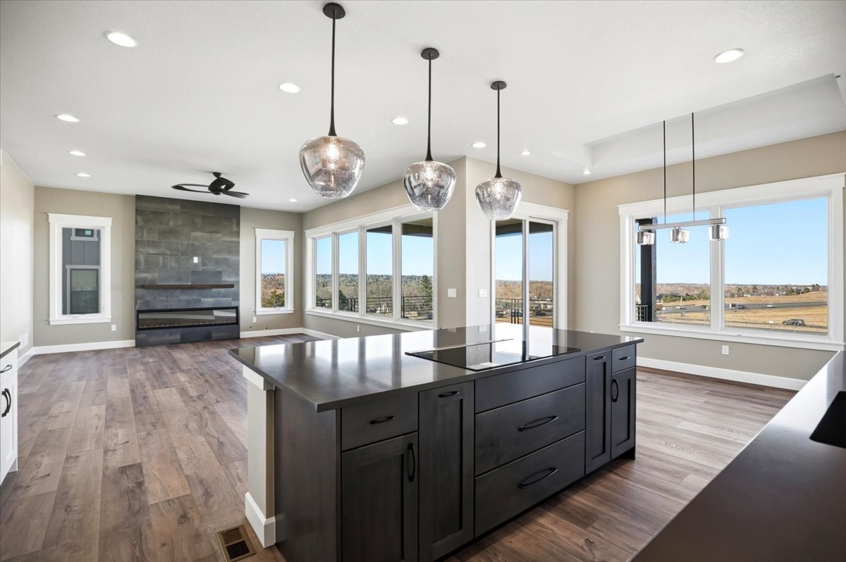 Plan #3964 - view from kitchen into great room, fireplace