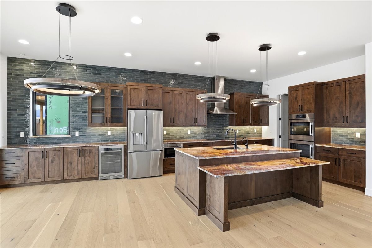 Plan 3461 kitchen full view with tiered island