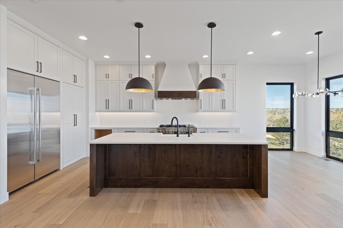 large kitchen island with custom pendants