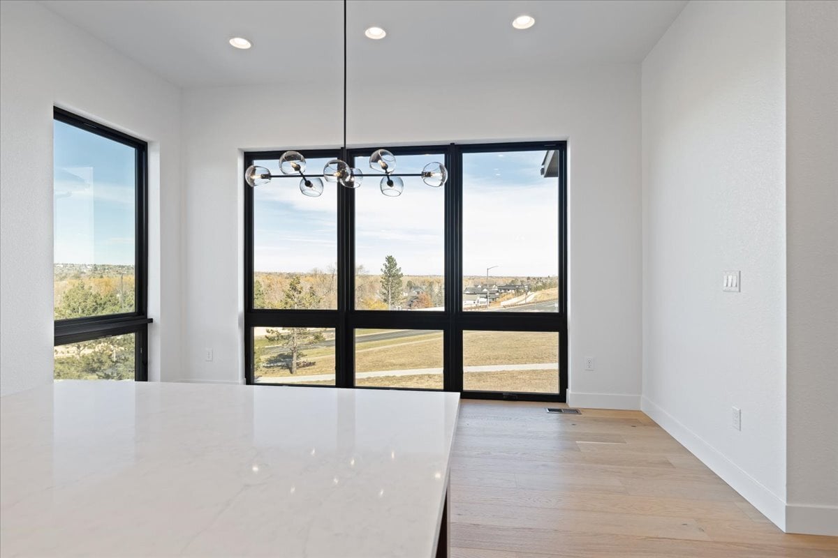 dining area with floor-to-ceiling windows
