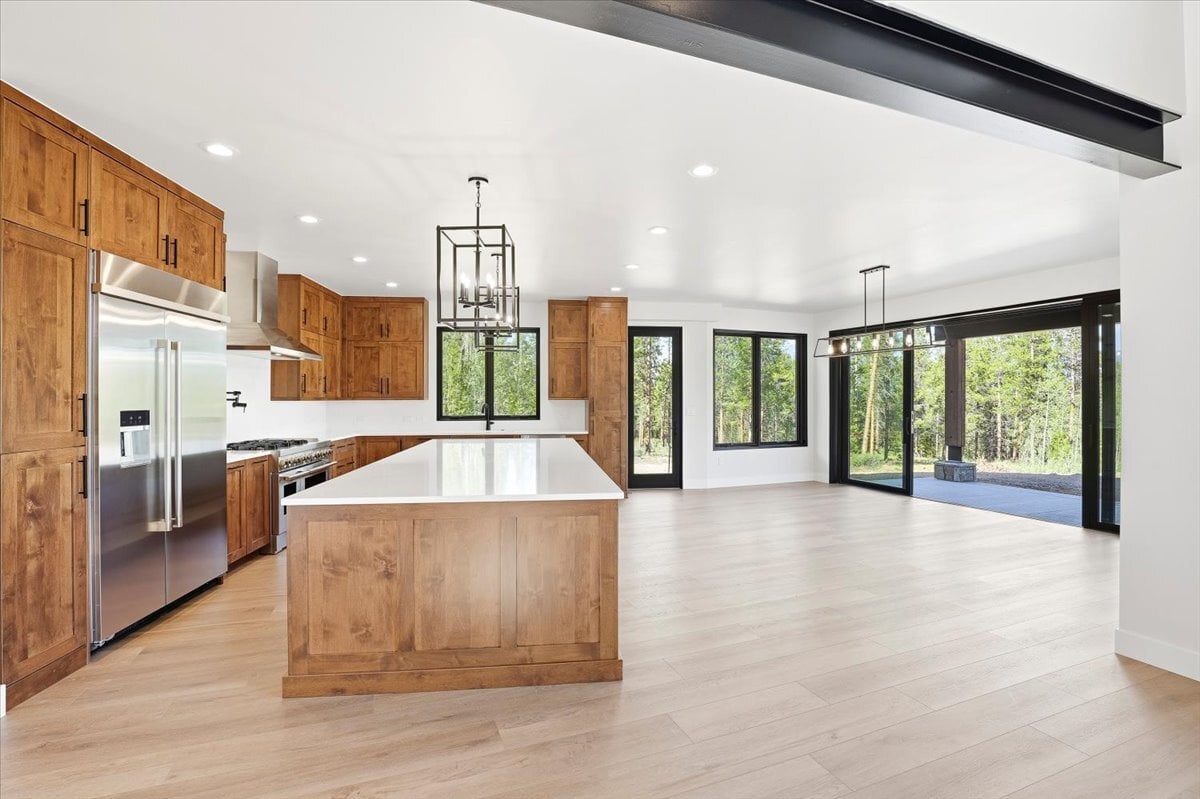 Fraser custom home - kitchen and dining area side view