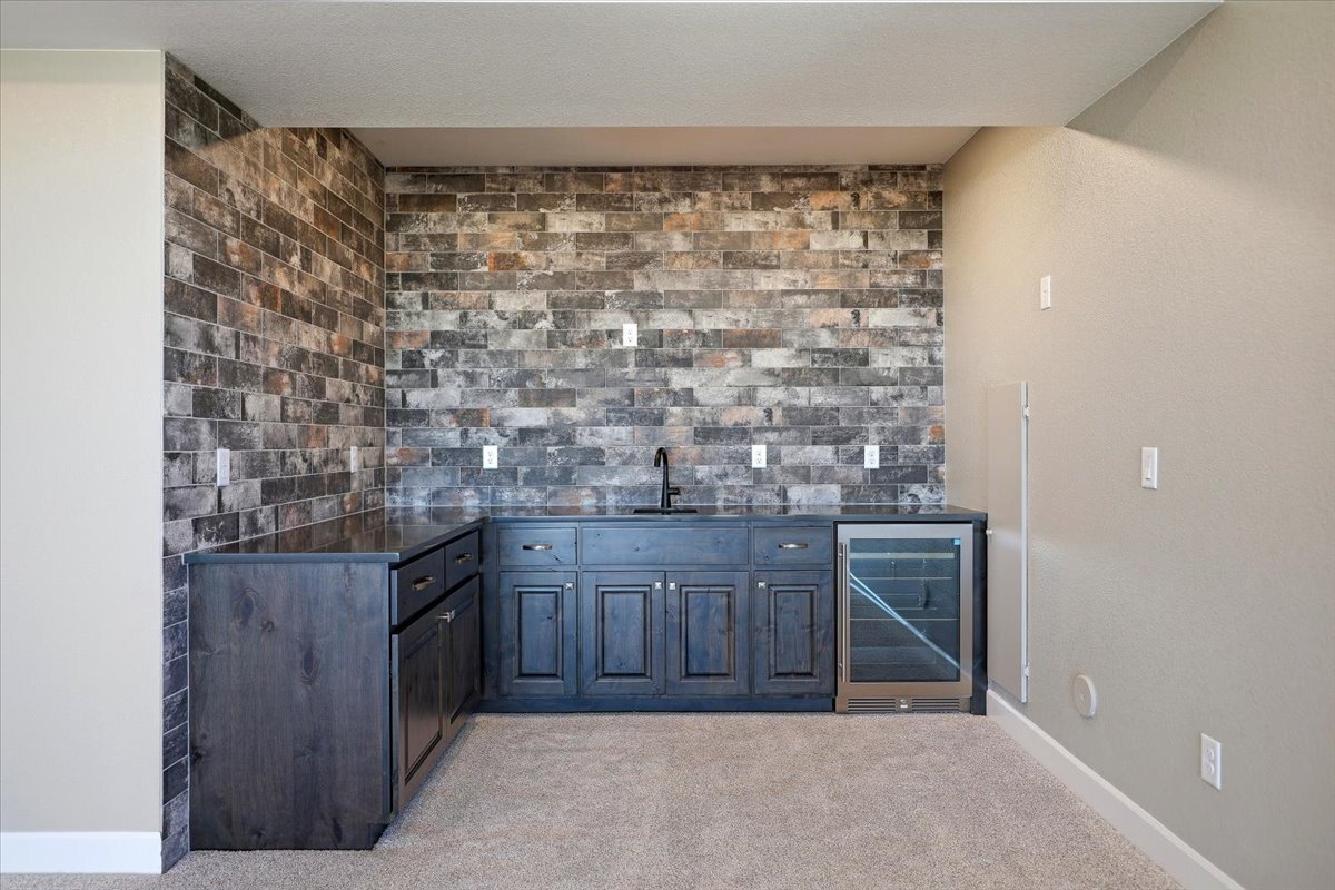 Plan #3964 - basement wet bar with bricked wall detail