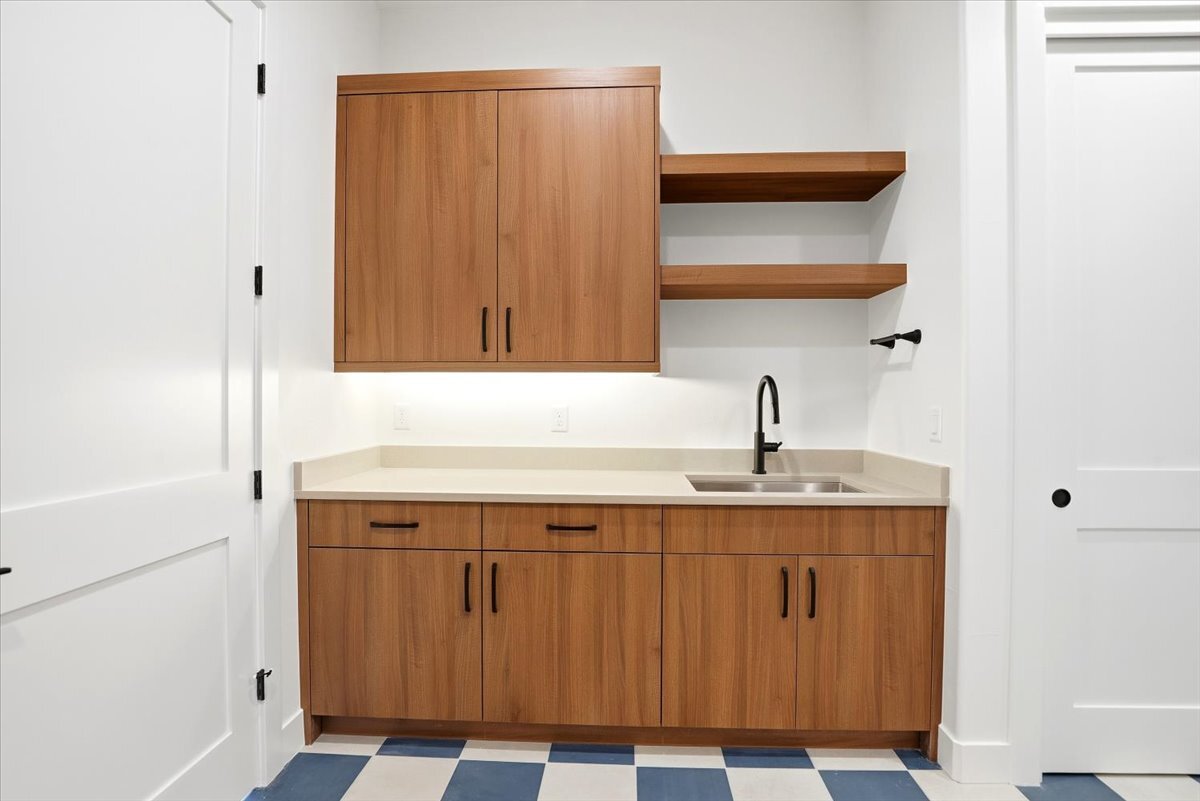 Plan 3461 laundry room utility sink and cupboards