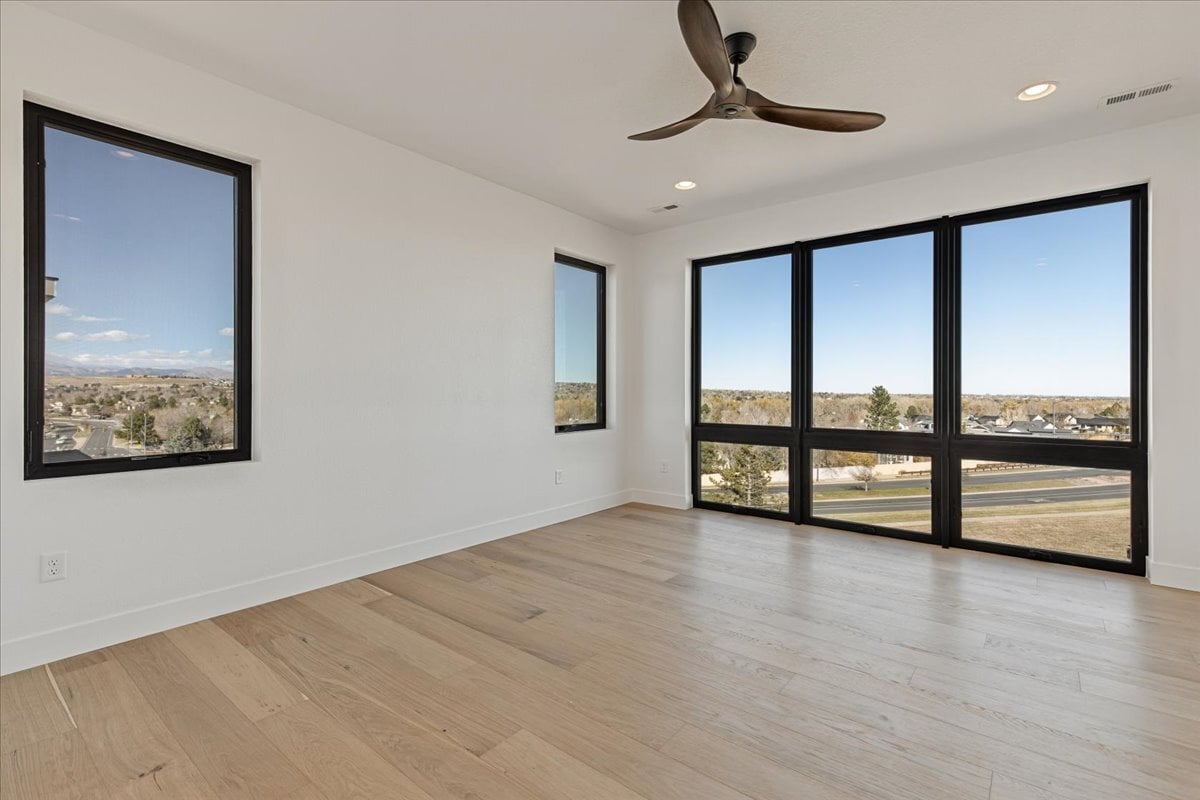 floor-to-ceiling windows in primary suite