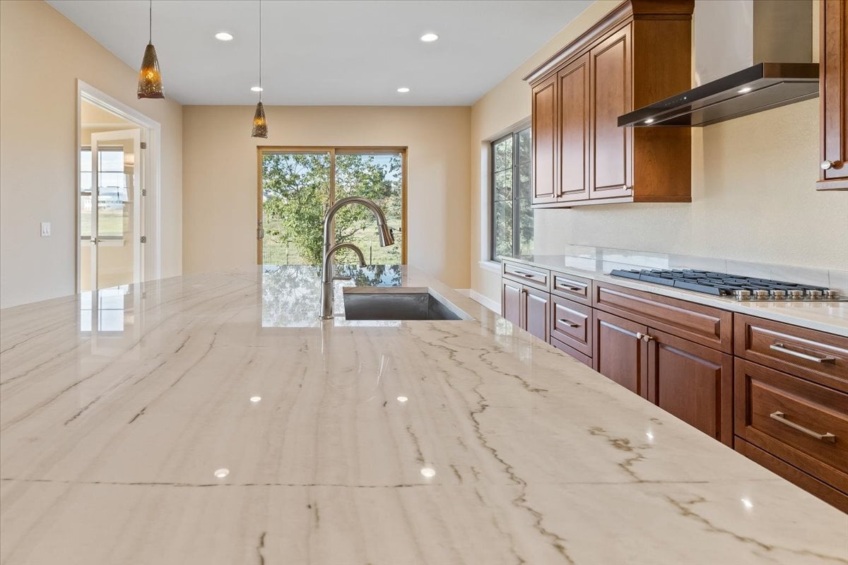 long view of kitchen island solid-surface counter top