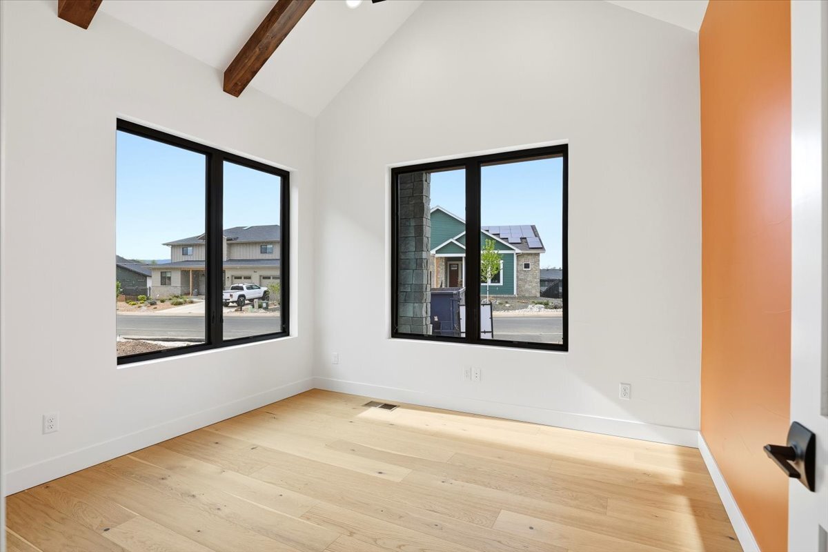 Plan 3461 main floor office with ceiling vault and beams