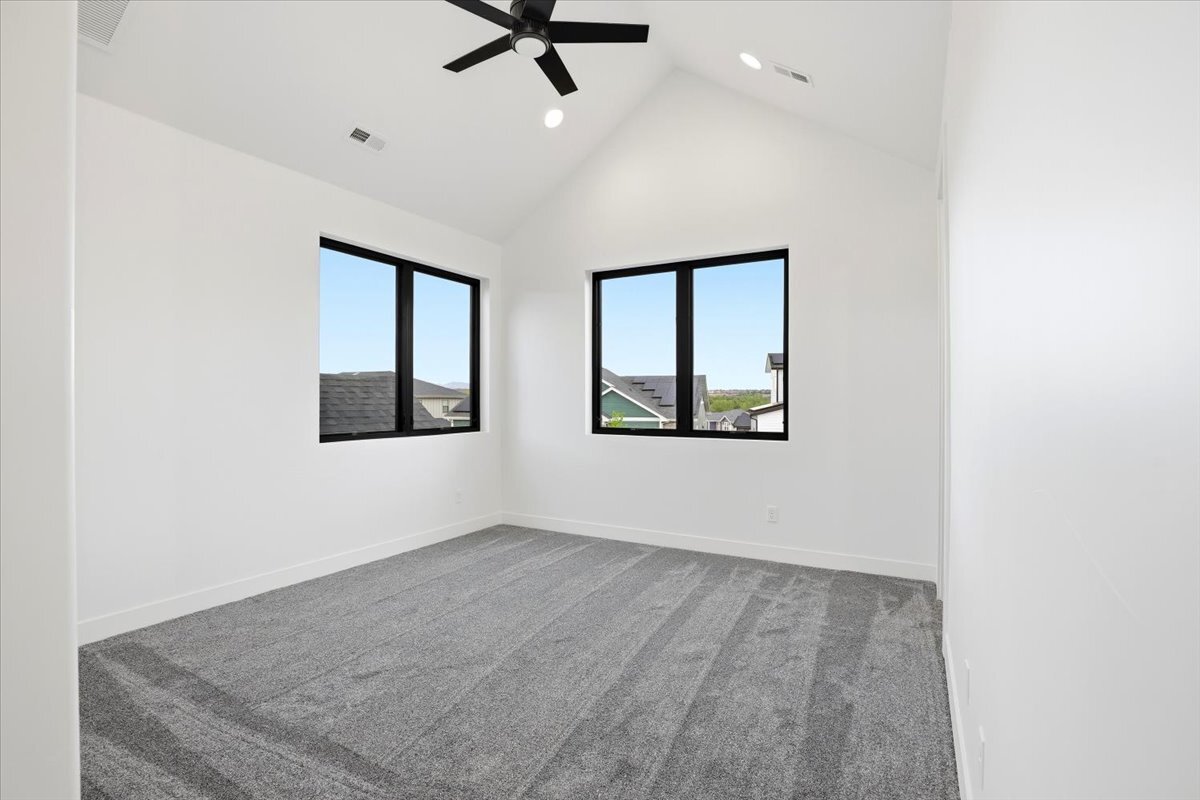 Plan 3461 secondary bedroom with vaulted ceiling