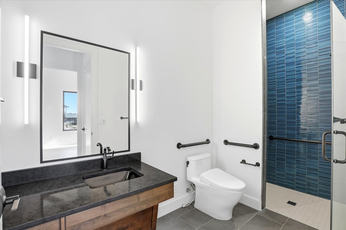 Plan 3461 main floor ADA bath with curbless shower