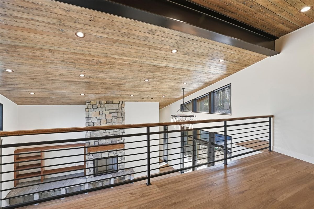 Fraser custom home - upstairs loft overlooking great room