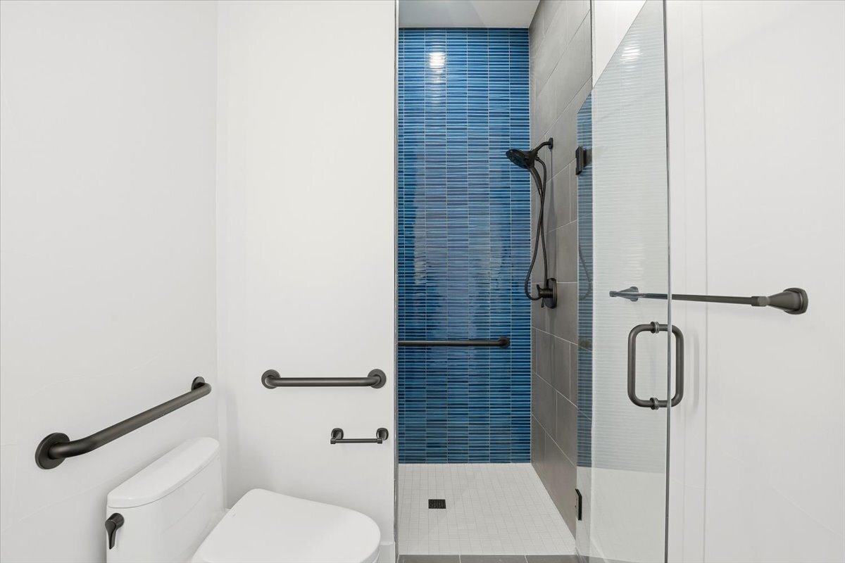 Plan 3461 main floor ADA shower with tile detail