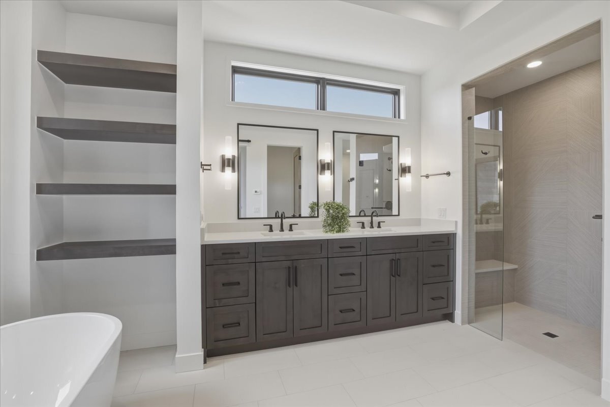 primary bath vanity and built-in, recessed shelving; walk-in curbless shower