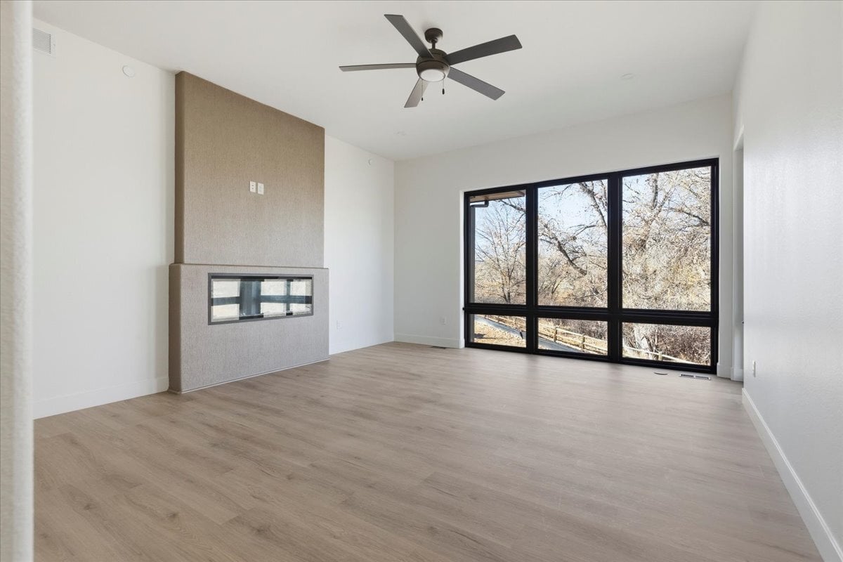 Plan 4977 lower level rec room with fireplace