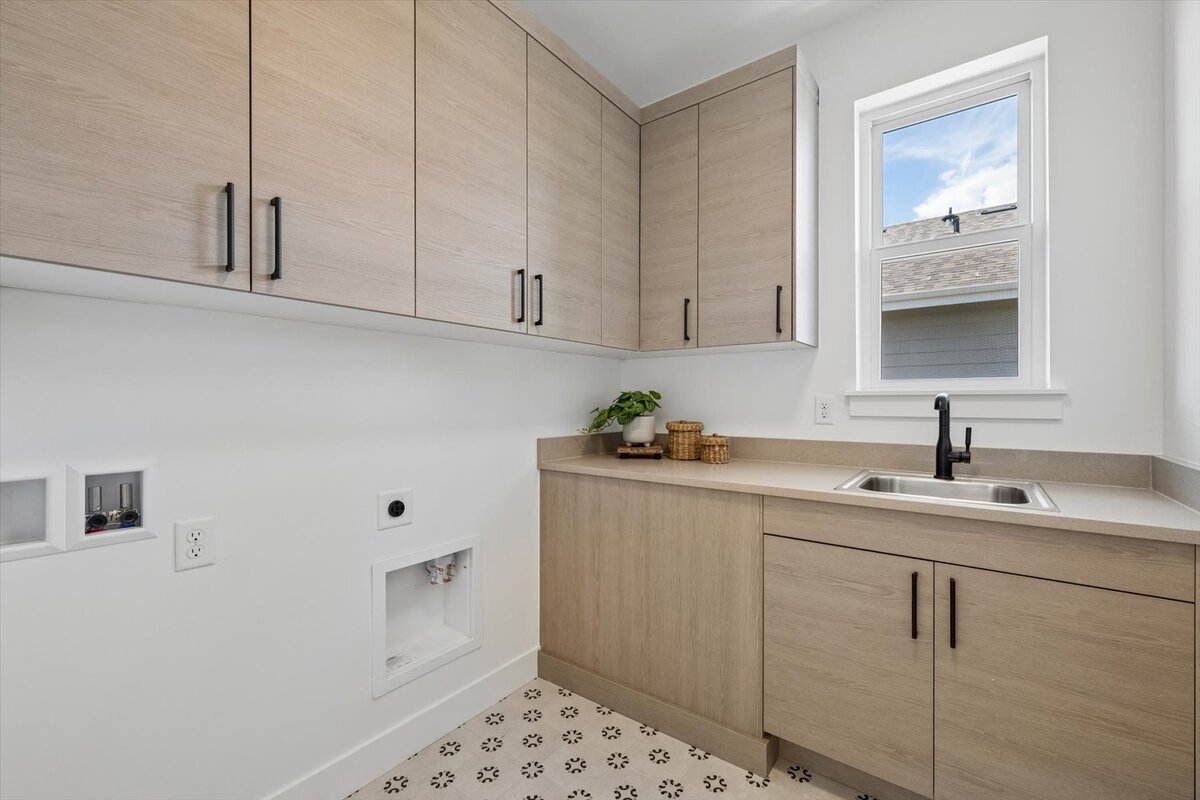 Sheffield Plan 3481-laundry room with custom tile flooring