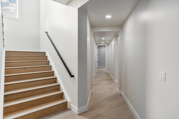 stairs leading to a finished basement