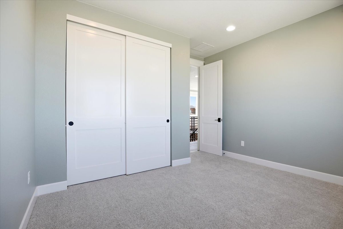 Plan #3964 - secondary bedroom with view to hallway