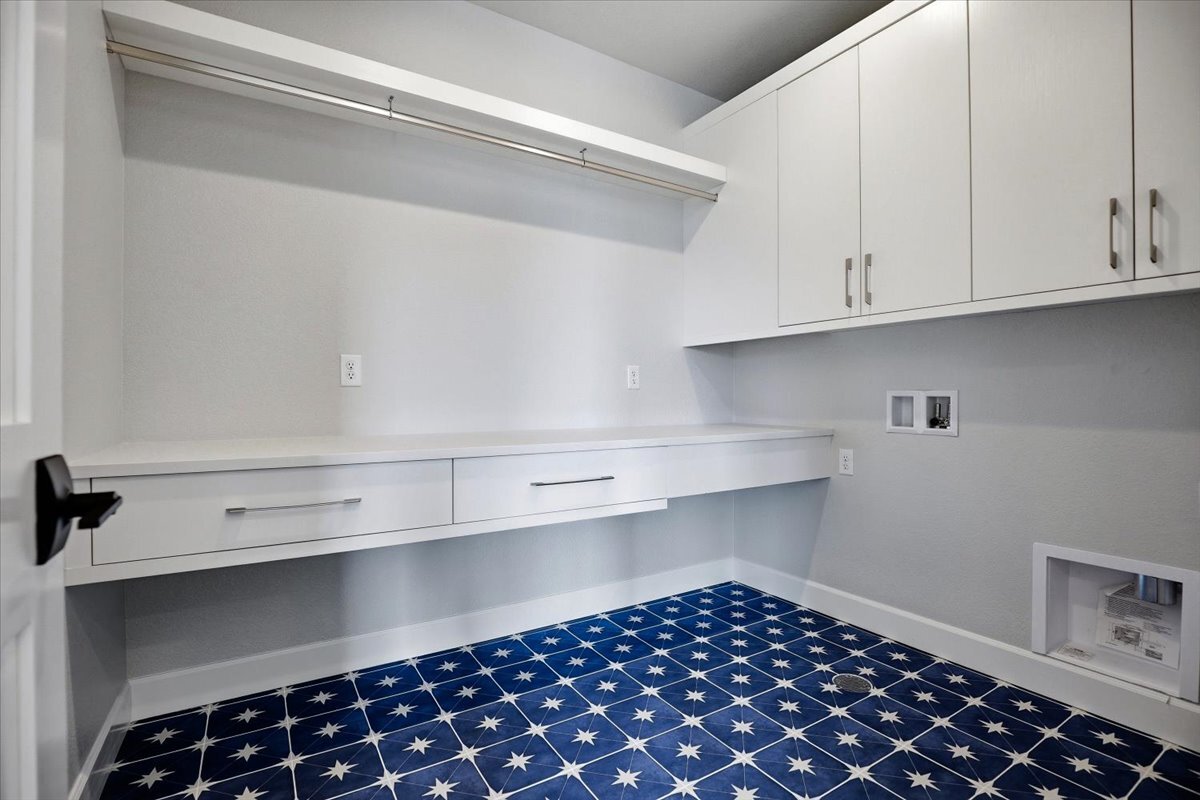 Plan #3964 - laundry room with stylish tiled floor