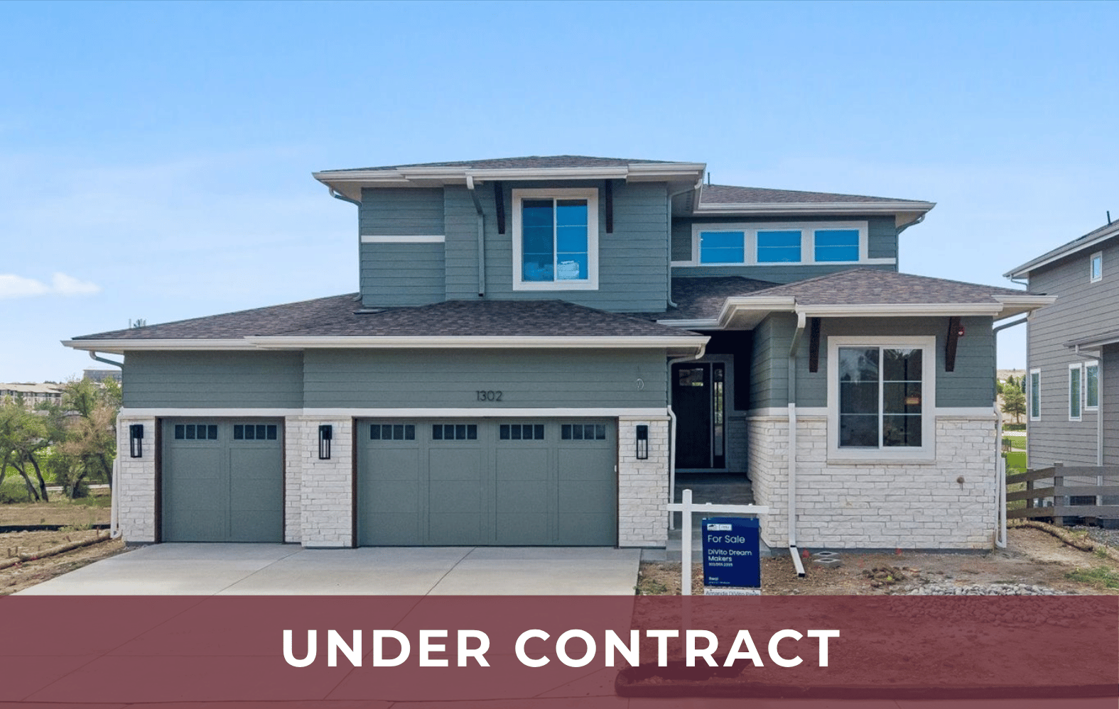 exterior of two-story stone and siding home in Superior, CO