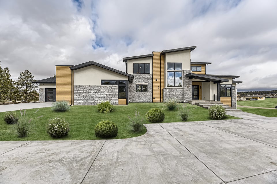 Front exterior of modern custom home by Sheffield Homes in Colorado