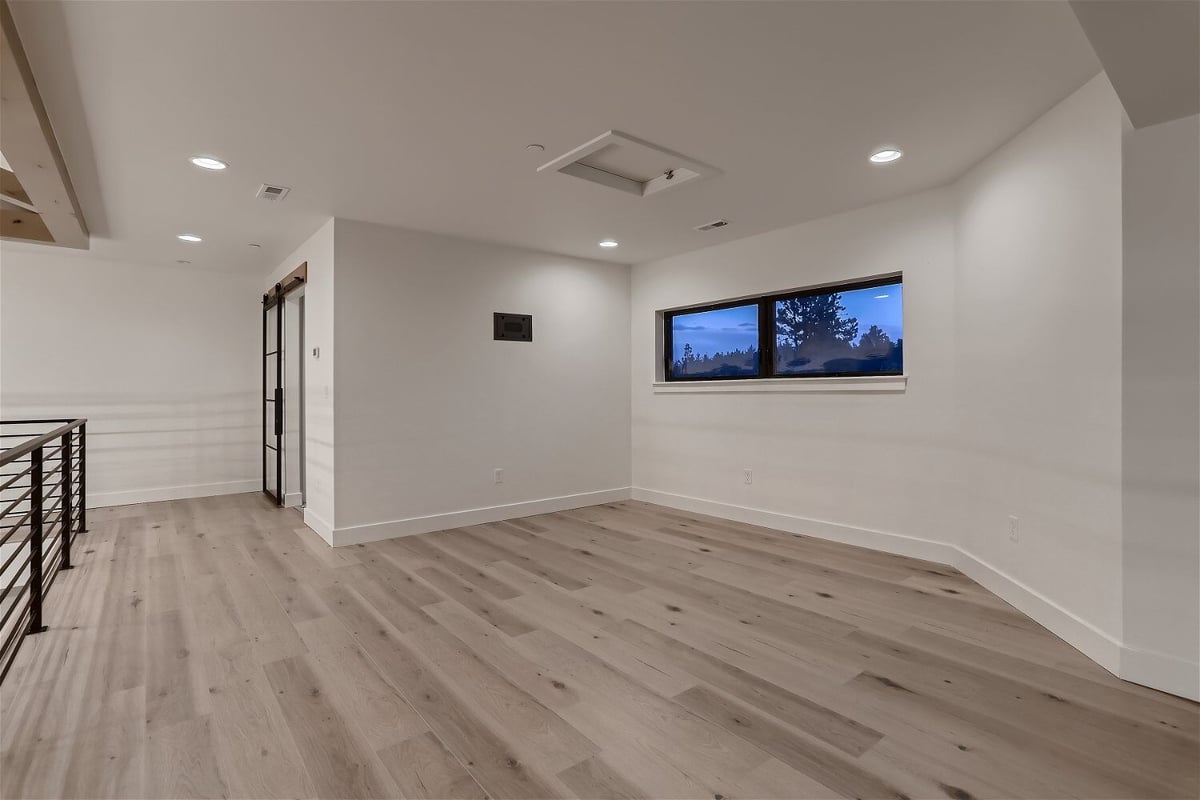 Wide-angle view of the second-floor loft in a custom home by Sheffield Homes in Evergreen, CO