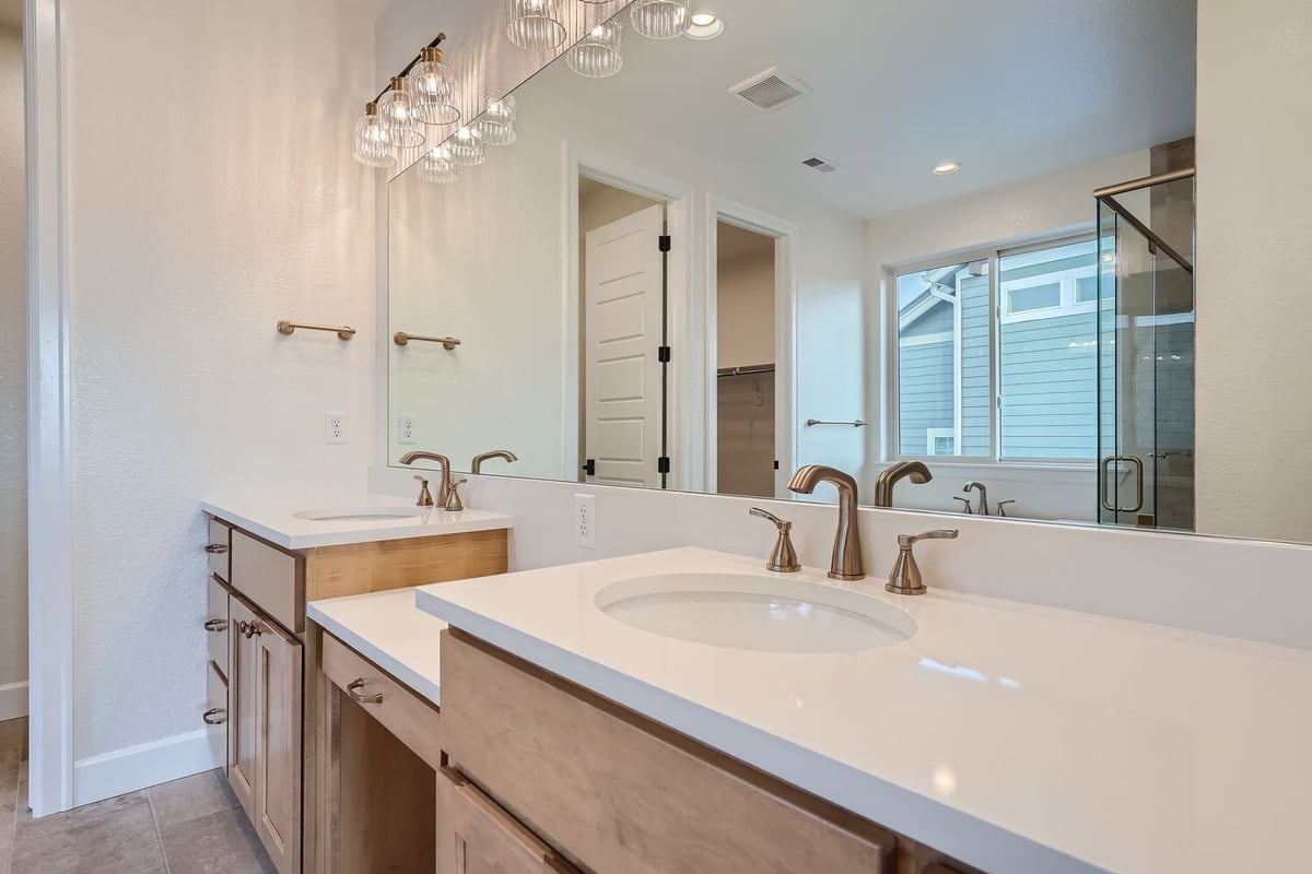 Modern bathroom with large mirror and twin vanities, Sheffield Homes, Denver, CO