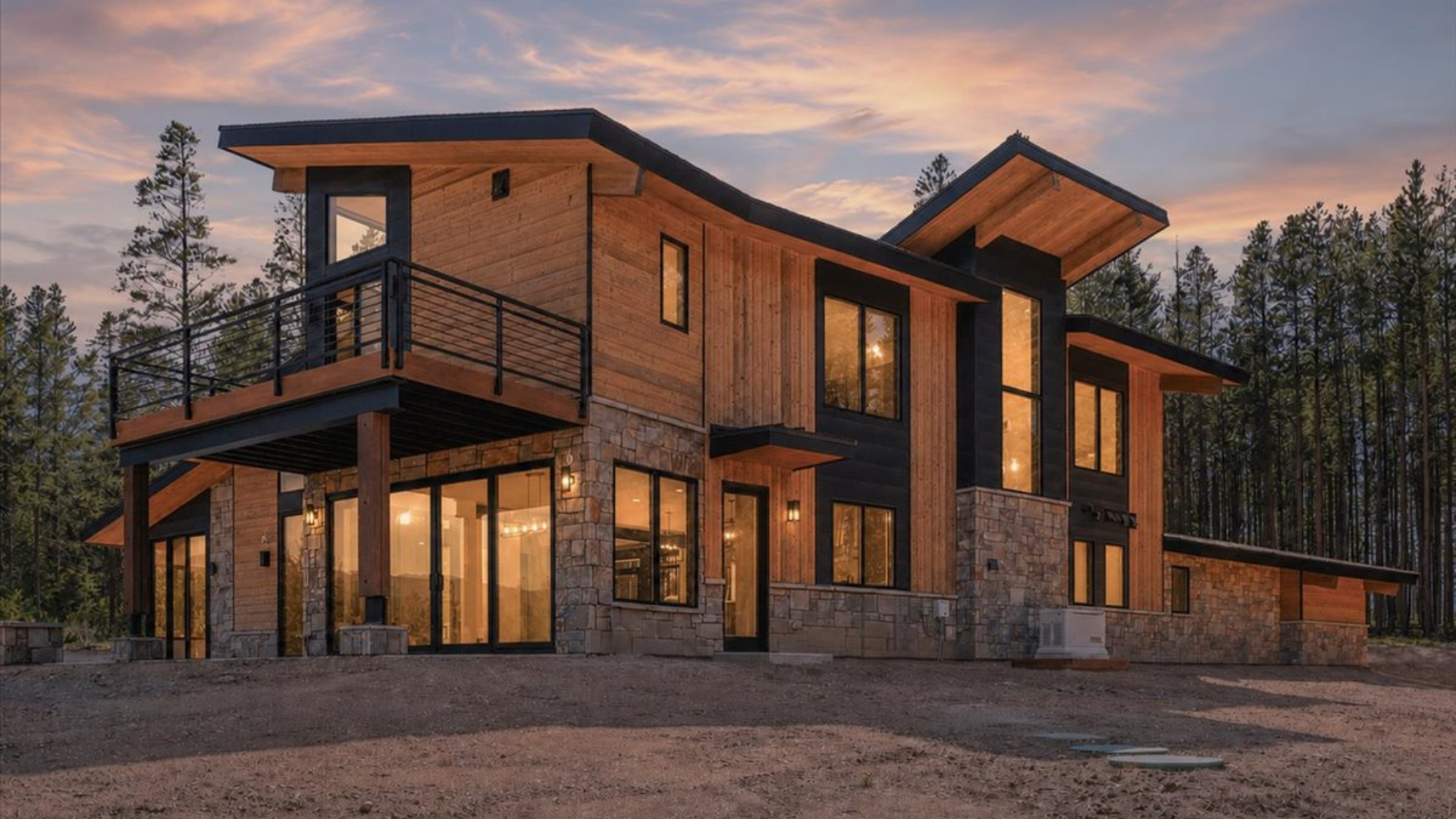 Fraser custom home - exterior rear view at twilight