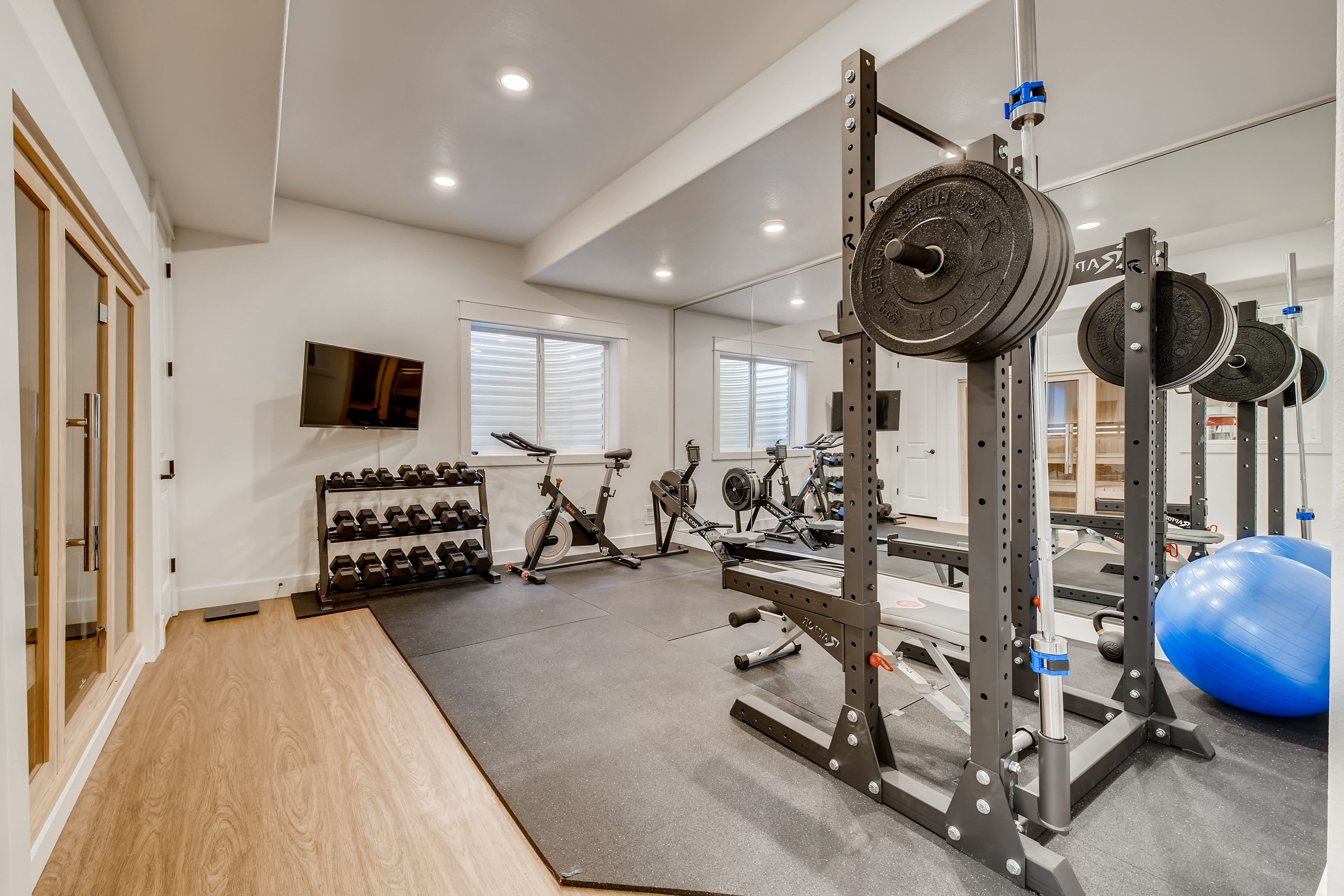 basement workout room with sauna